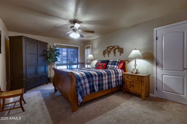 a bathroom with a mirror and a shower