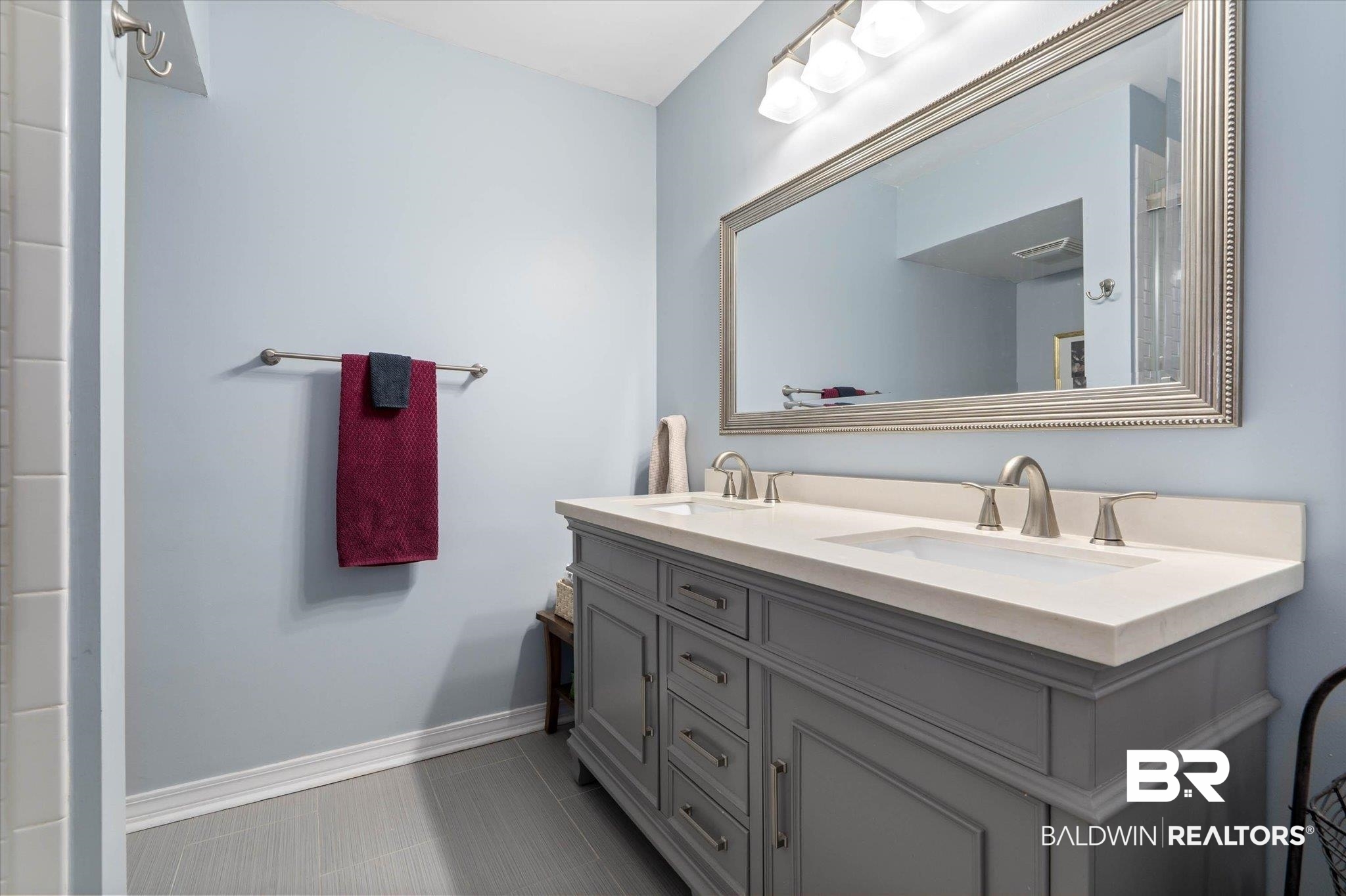 559 East Cumberland Road Mobile, AL 36608 - Photo 26 of 48 Full bathroom with double vanity and baseboards