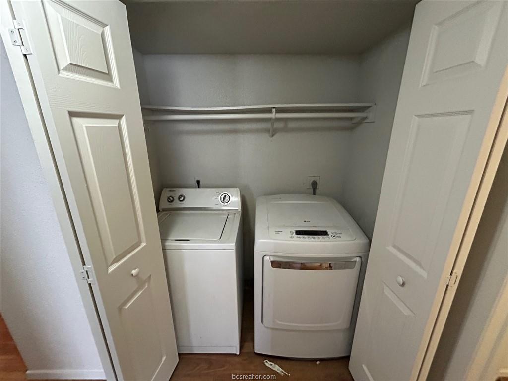 1535 Pine Ridge Drive, Unit C College Station, TX 77840 - Photo 12 of 14 a utility room with dryer and washer