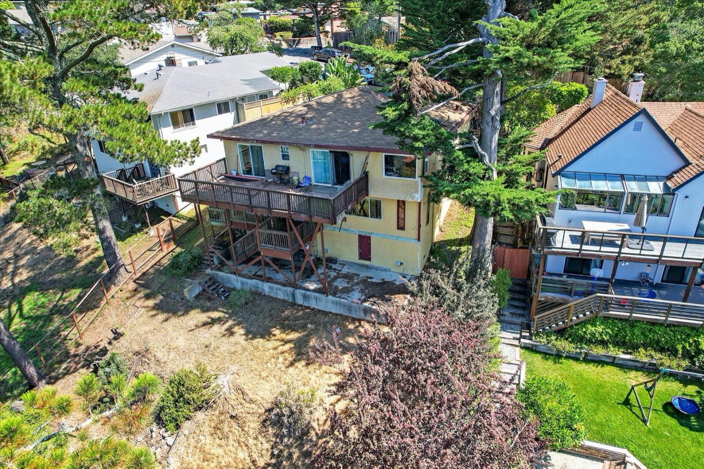6821 Ridgewood Drive Oakland, CA 94611 - Photo 18 of 26 a front view of a house with garden