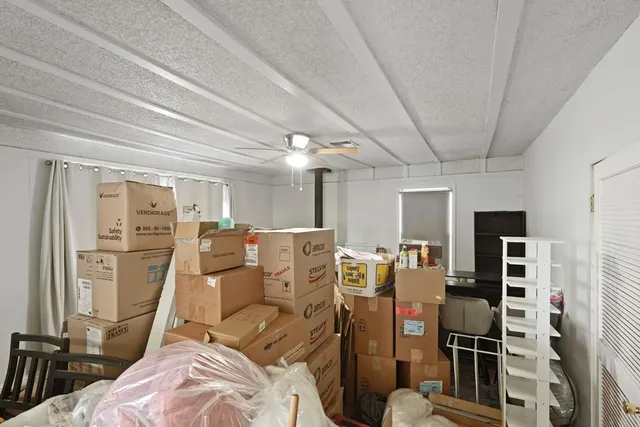 a bed room with a bed and a walk in closet