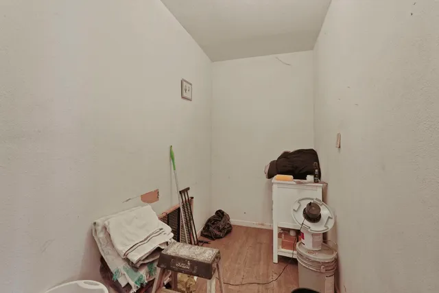 a table with chairs and a stove top oven