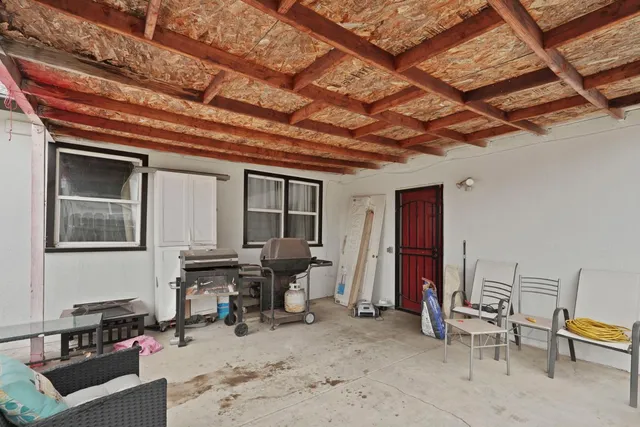 a view of living room filled with furniture