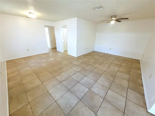 a view of an empty room and window