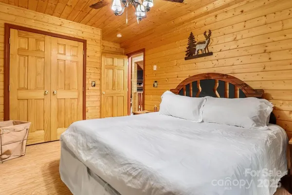 a bedroom with a bed and a cabinets