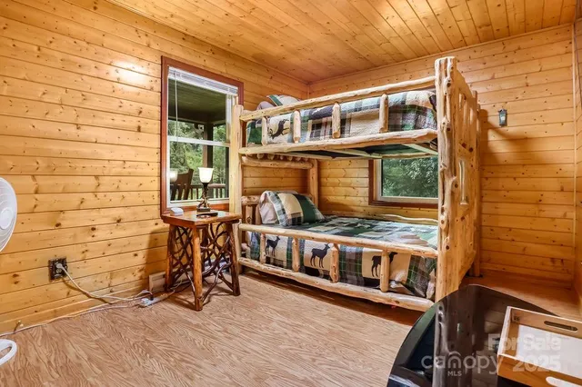a view of a balcony with chairs