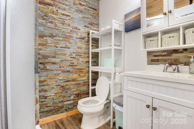a bathroom with a toilet and a sink