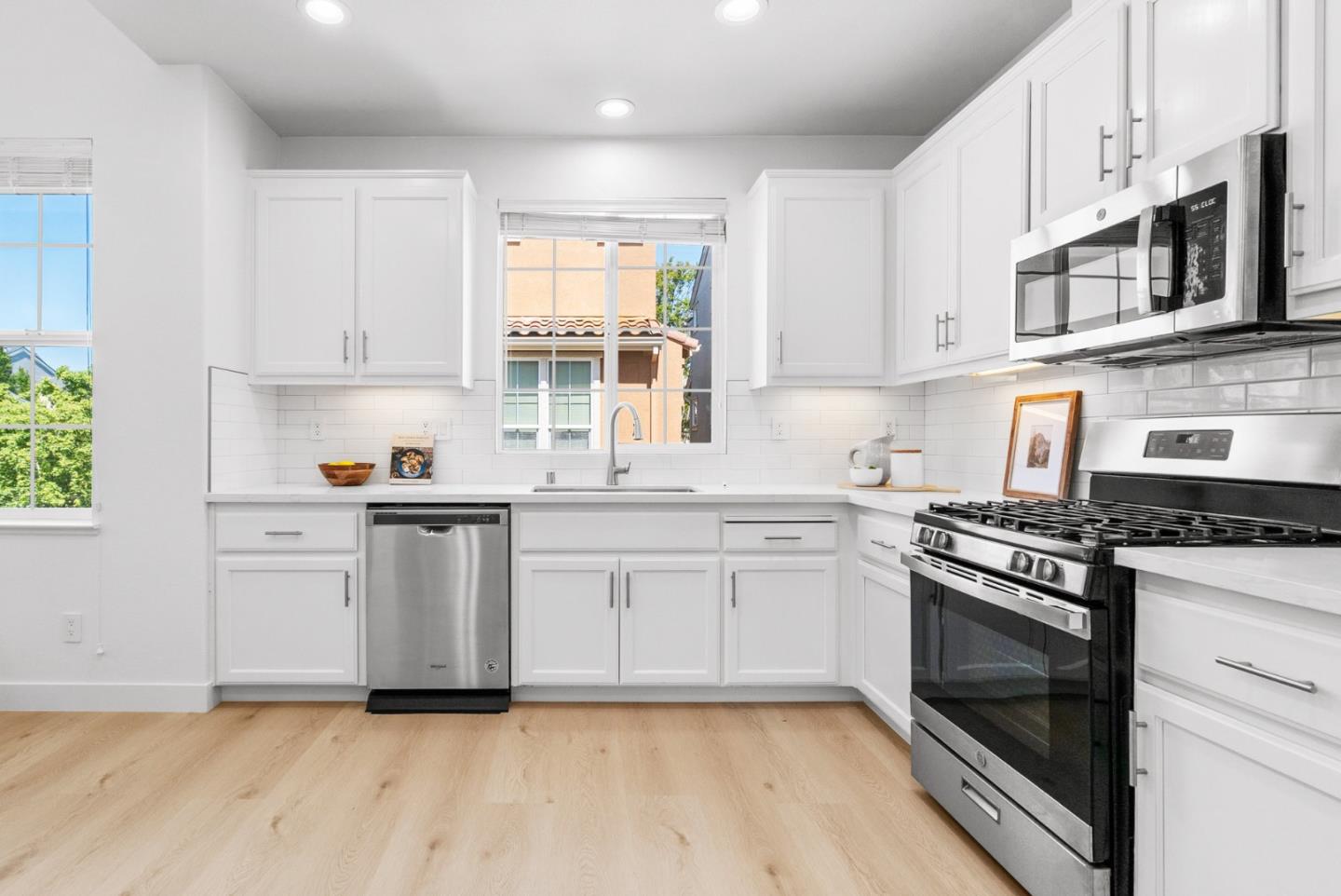 4337 Watson Circle Santa Clara, CA 95054 - Photo 15 of 55 a kitchen with granite countertop white cabinets and appliances