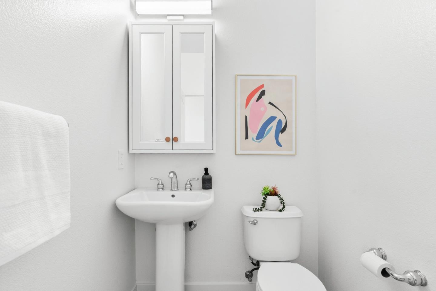 4337 Watson Circle Santa Clara, CA 95054 - Photo 24 of 55 a bathroom with a toilet sink and mirror