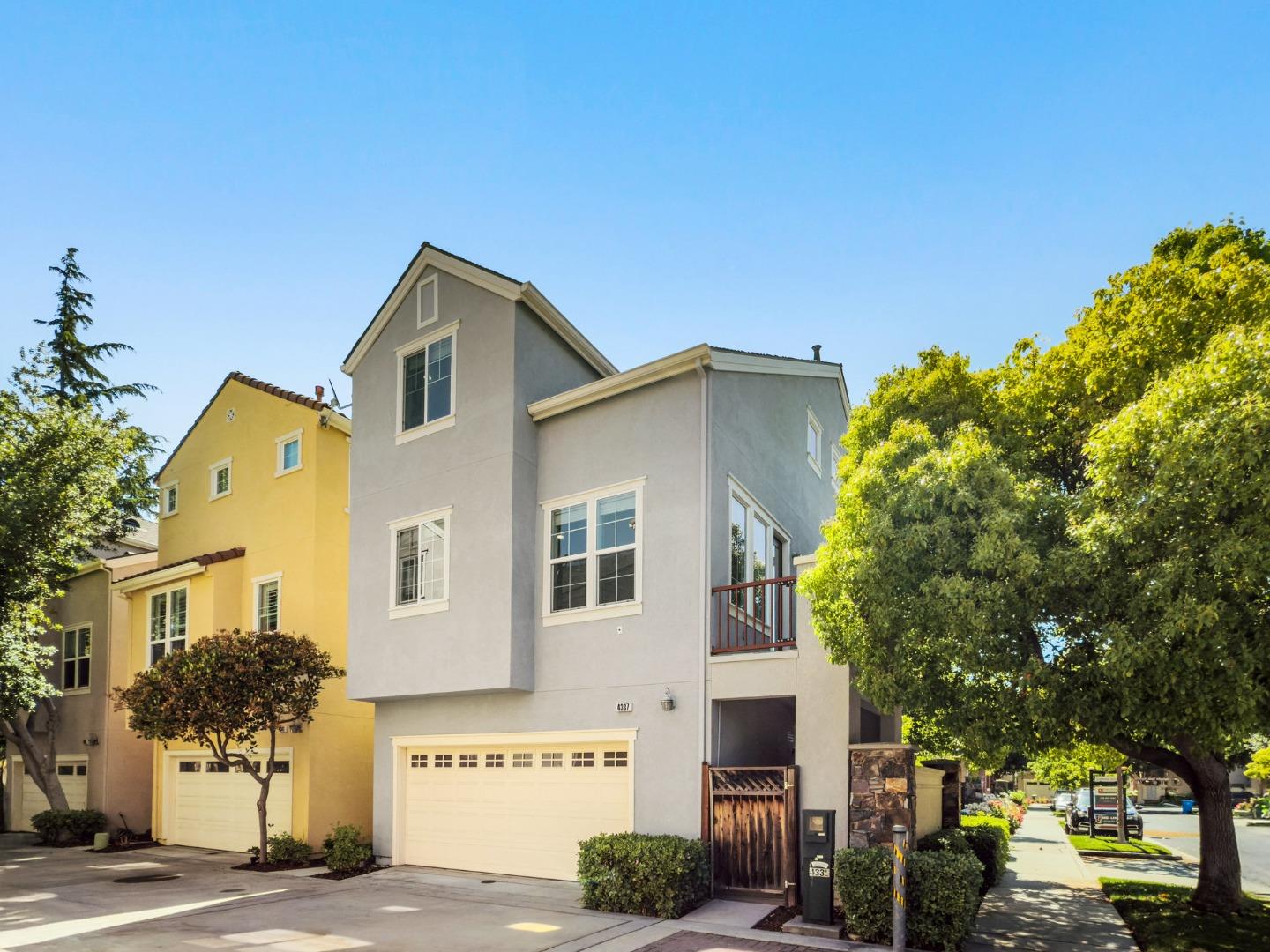 4337 Watson Circle Santa Clara, CA 95054 - Photo 49 of 55 a front view of a house with a yard and garage