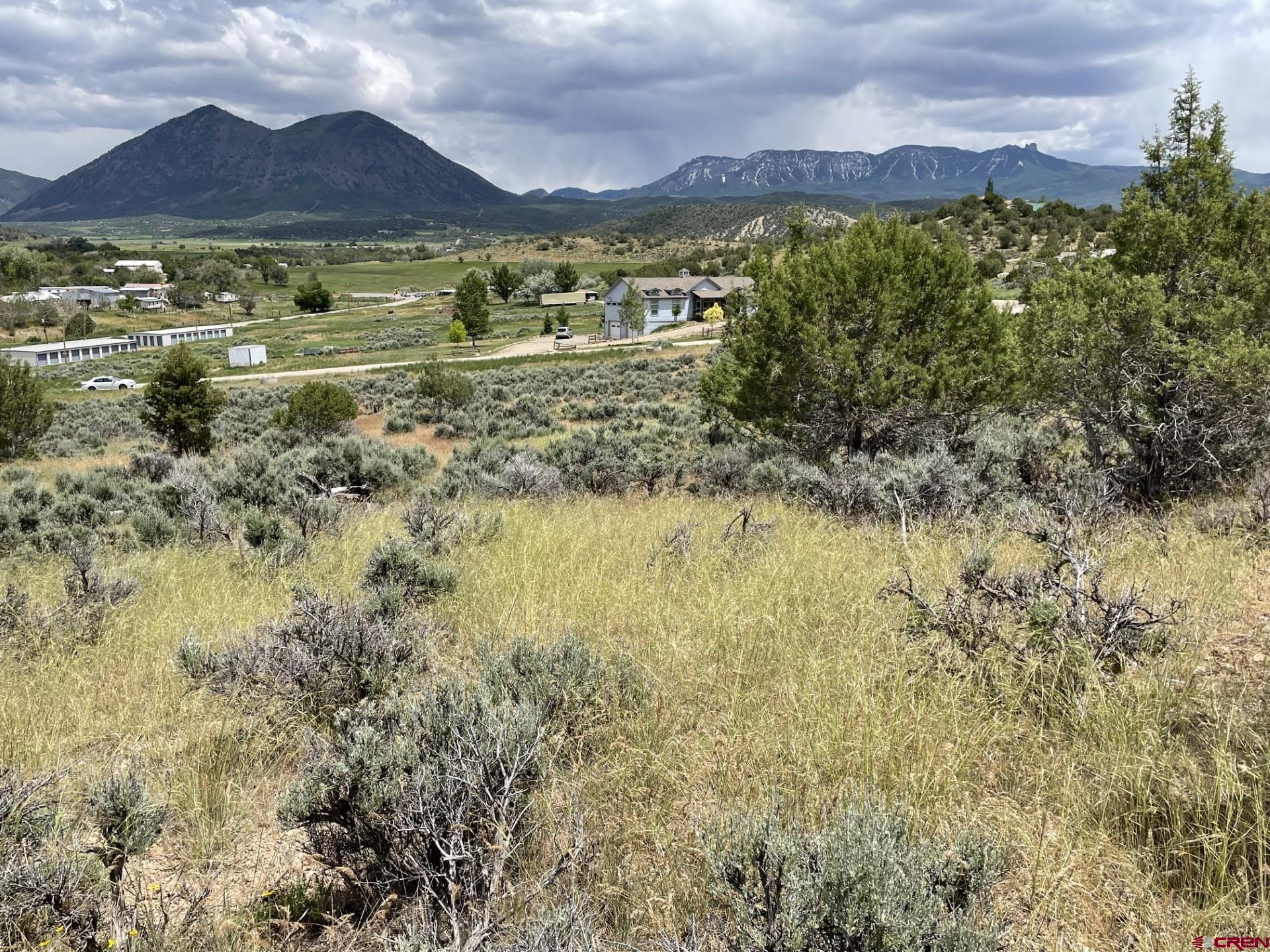 Lot 8 D Road Crawford, CO 81415 - Photo 4 of 14 a view of an aerial view of residential houses with outdoor space and trees