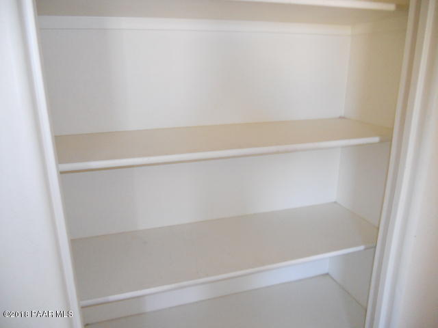 25725 Poppy Road Paulden, AZ 86334 - Photo 12 of 13 a close up view of racks on the wall