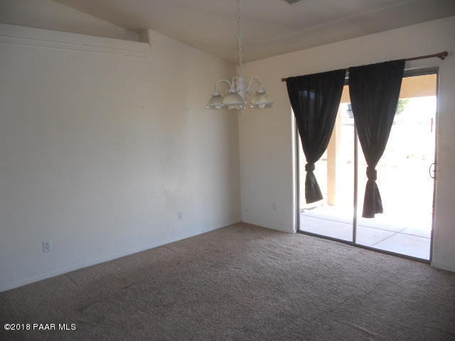 25725 Poppy Road Paulden, AZ 86334 - Photo 3 of 13 a view of empty room with windows