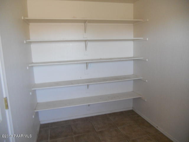 25725 Poppy Road Paulden, AZ 86334 - Photo 4 of 13 a view of an empty walk in closet