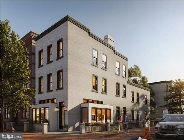 a front view of a building with street view