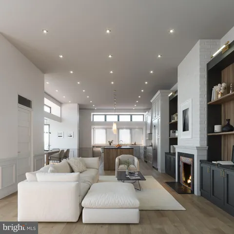 a living room with fireplace furniture and a flat screen tv