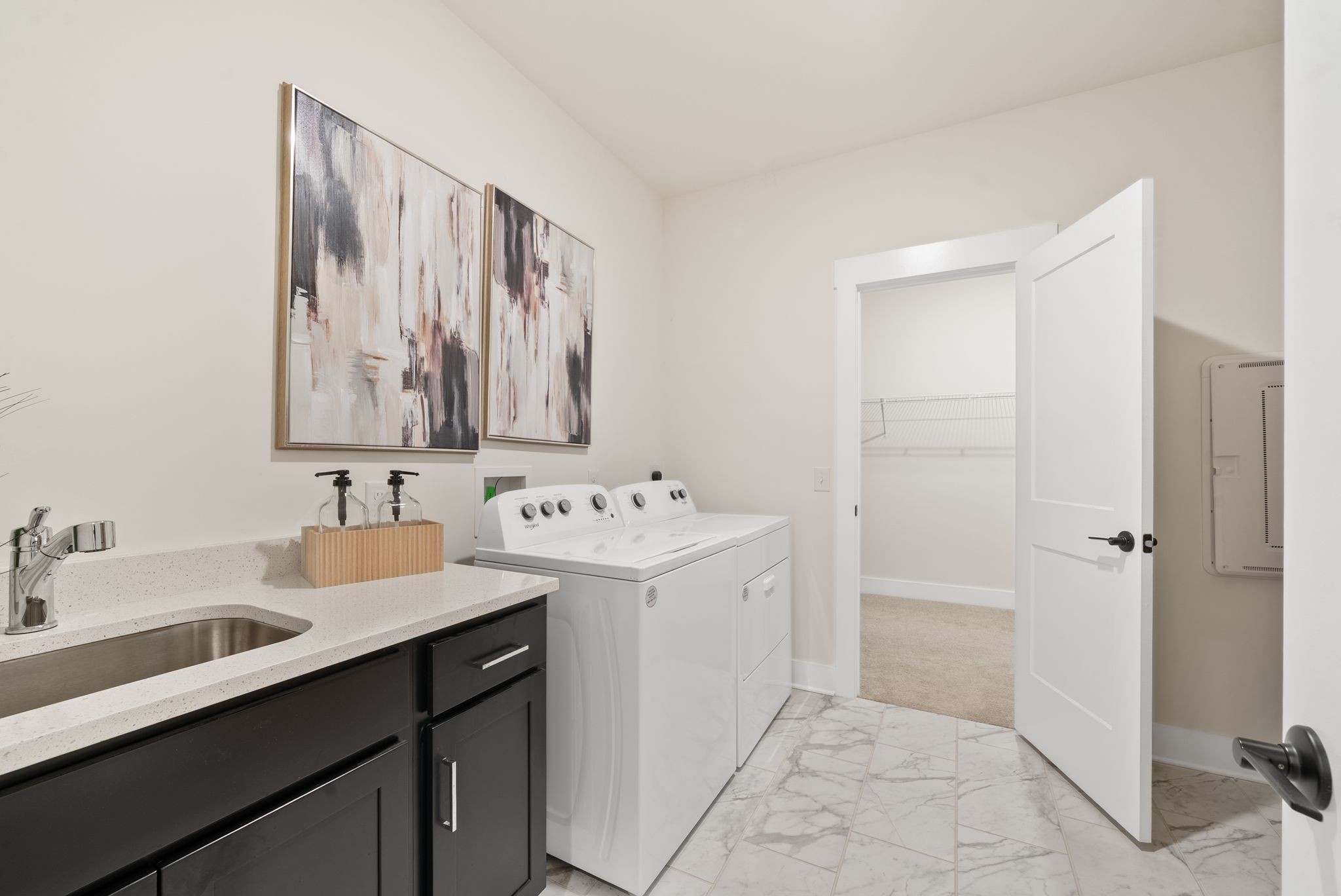 4043 John Marsh Road Spring Hill, TN 37174 - Photo 44 of 56 a bathroom with a sink and a mirror