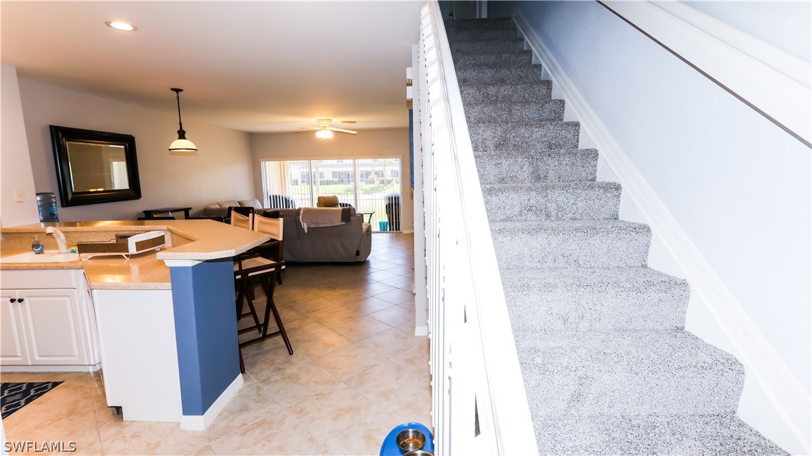 11709 Eros Road Lehigh Acres, FL 33971 - Photo 11 of 25 a dinning room with a table and chairs
