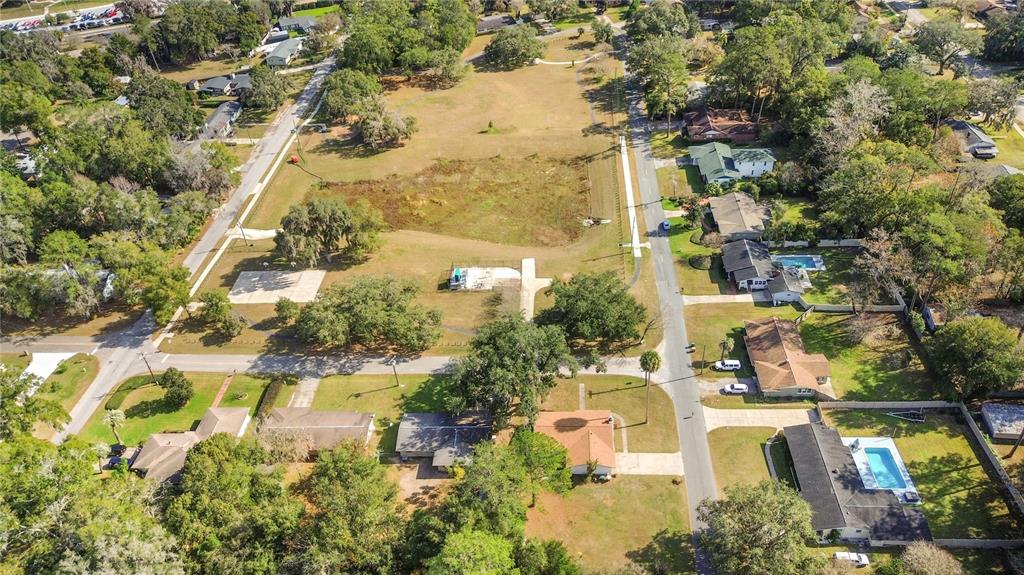 2236 Southeast 8th Avenue Ocala, FL 34471 - Photo 2 of 49 an aerial view of residential houses with outdoor space