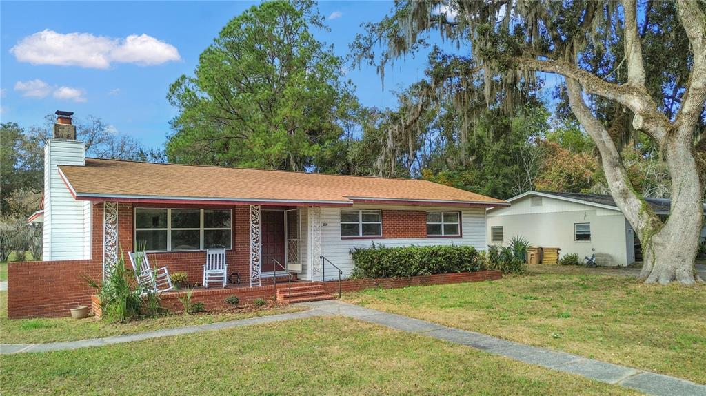 2236 Southeast 8th Avenue Ocala, FL 34471 - Photo 36 of 49 a view of house with a yard and potted plants
