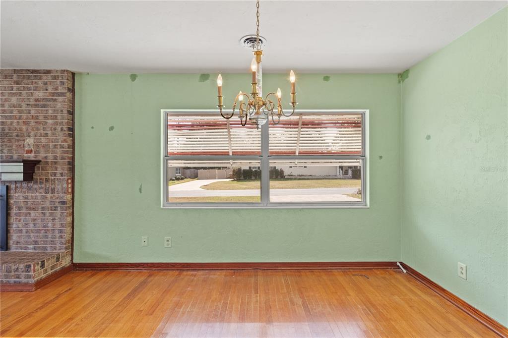 2236 Southeast 8th Avenue Ocala, FL 34471 - Photo 9 of 49 a view of a room with window and chandelier