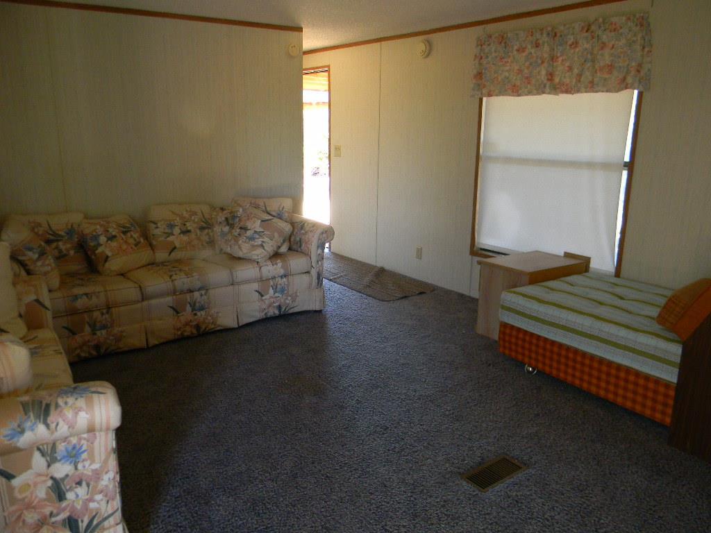 4180 Stirrup Road Snowflake, AZ 85937 - Photo 5 of 11 a bedroom with a bed and a window