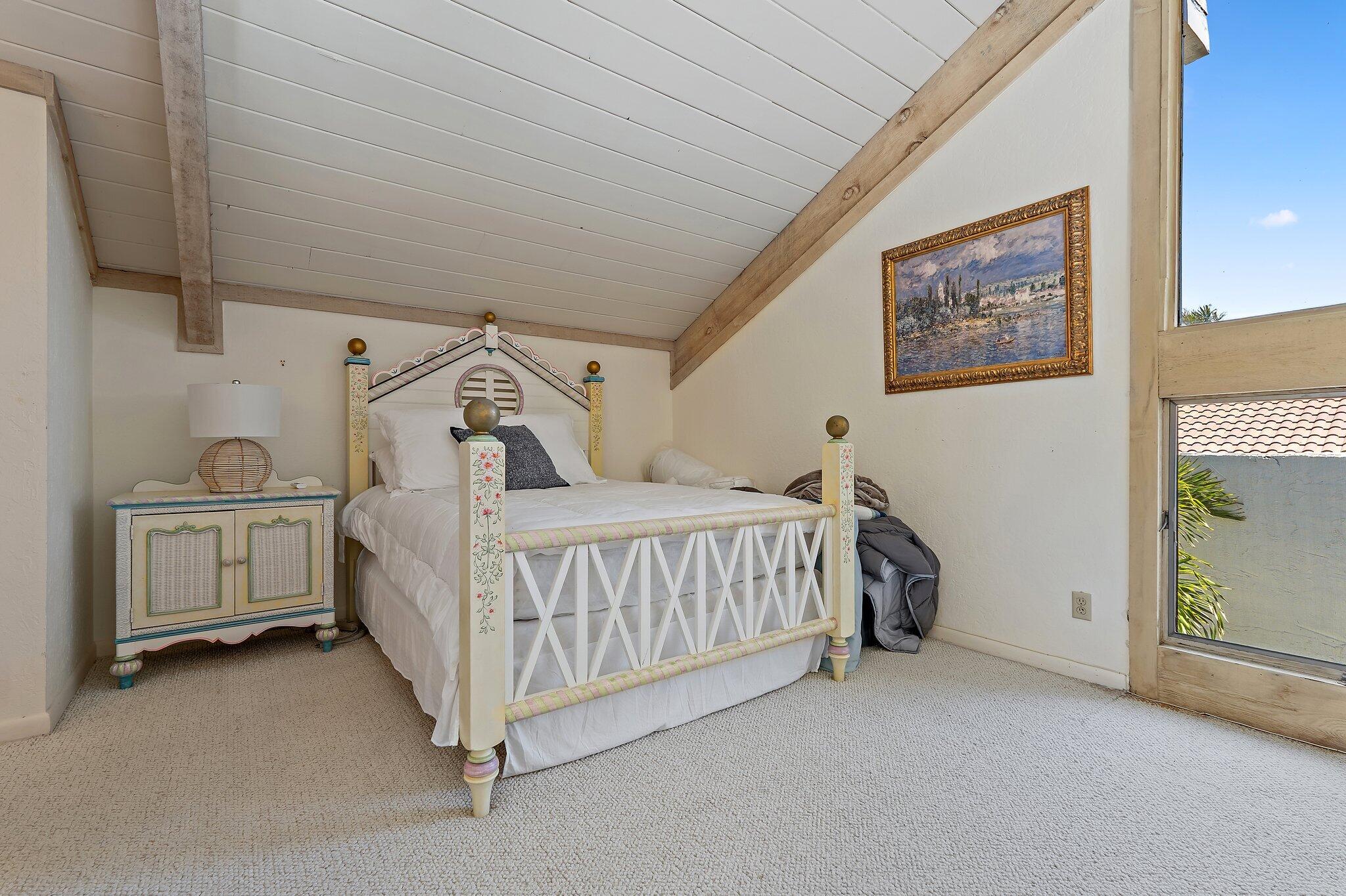 131 Bonefish Circle Jupiter, FL 33477 - Photo 32 of 48 a bedroom with a bed and a baby crib
