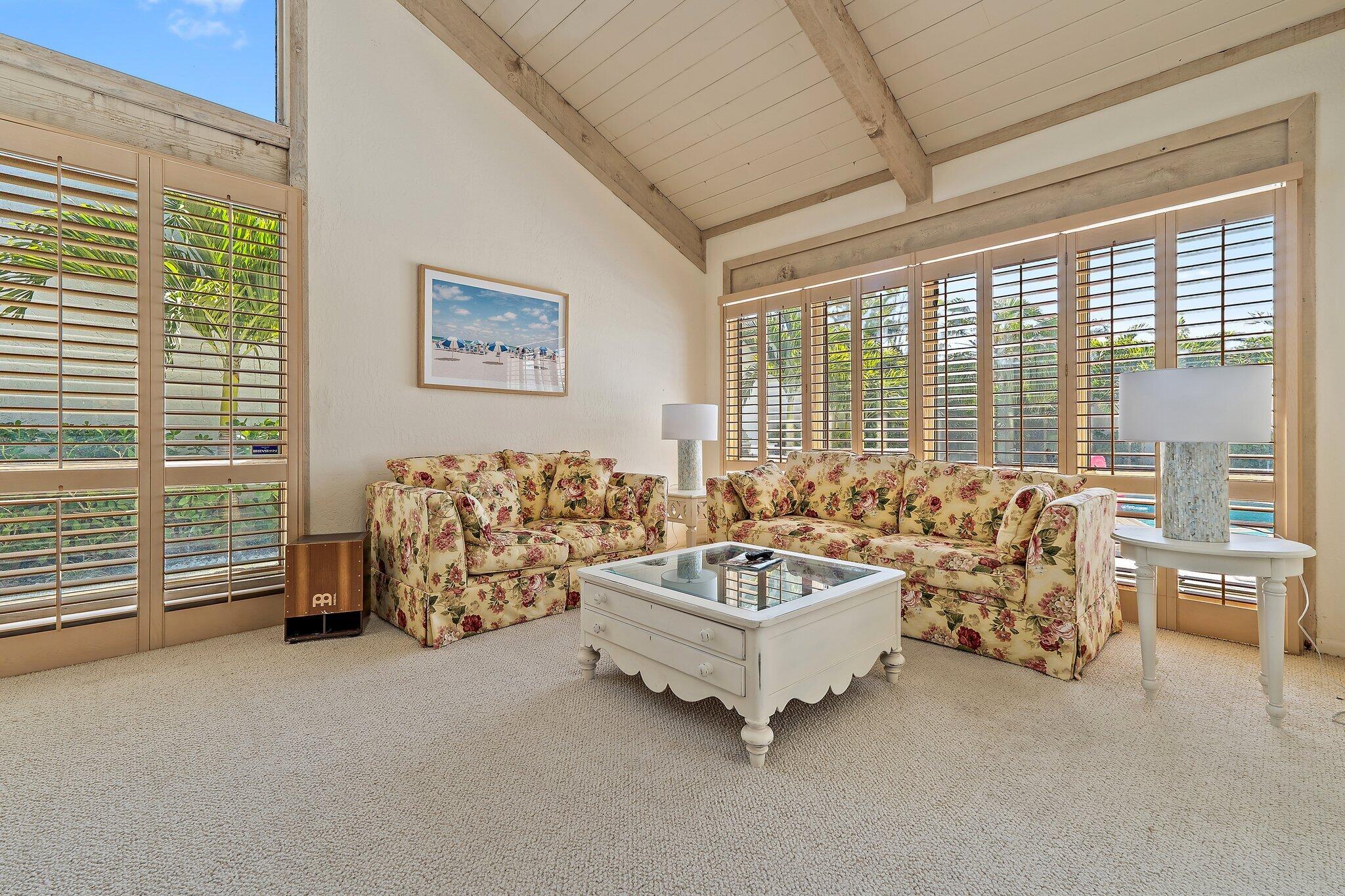 131 Bonefish Circle Jupiter, FL 33477 - Photo 10 of 48 a spacious bedroom with furniture and a large window