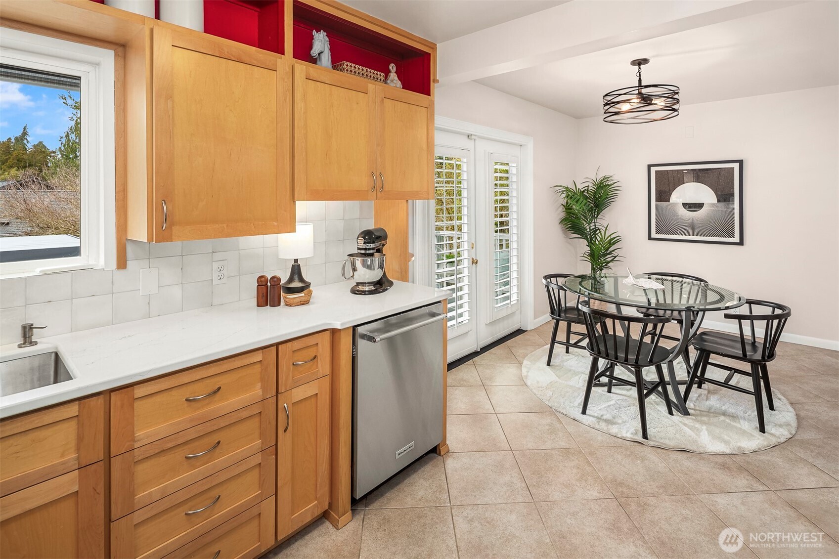 6939 Fauntleroy Way Southwest Seattle, WA 98136 - Photo 12 of 35 a kitchen with a cabinets and chairs