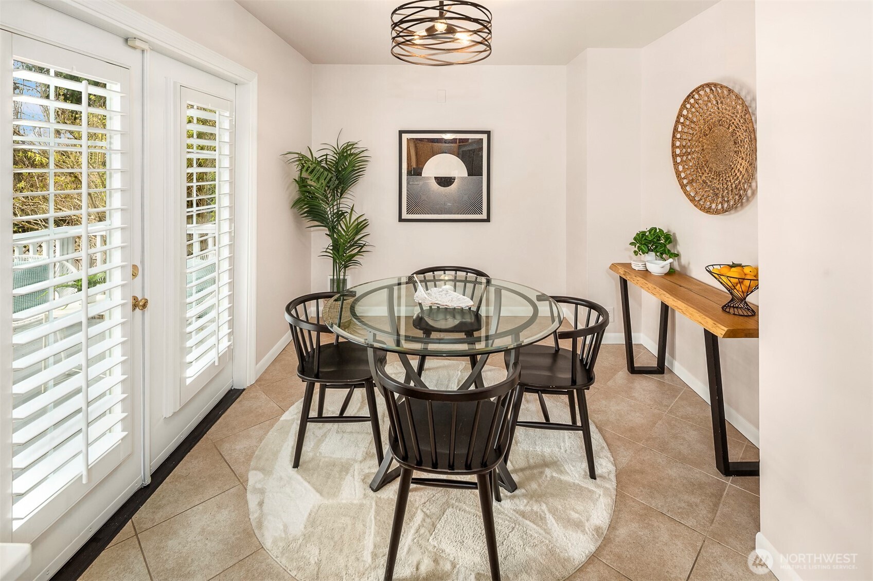 6939 Fauntleroy Way Southwest Seattle, WA 98136 - Photo 13 of 35 a view of a dining room with furniture and wooden floor