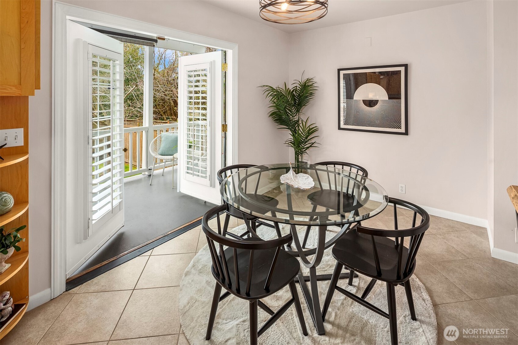 6939 Fauntleroy Way Southwest Seattle, WA 98136 - Photo 14 of 35 a view of a dining room with furniture window and outside view