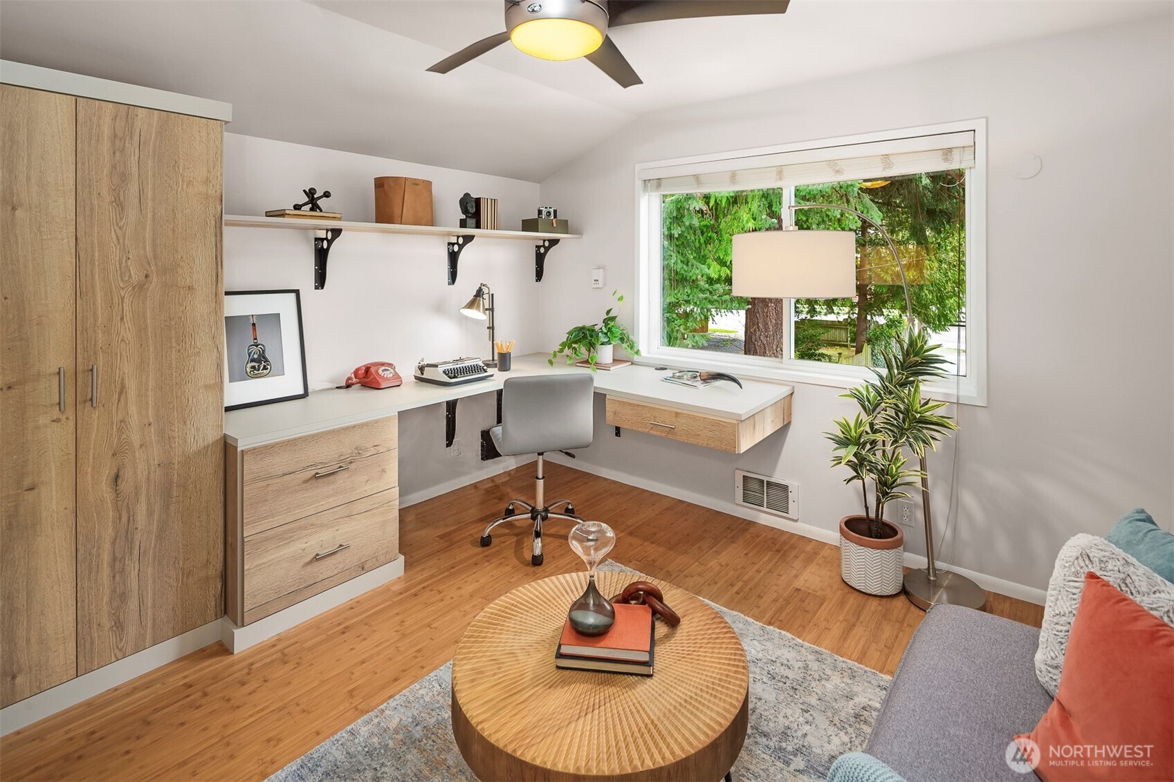 6939 Fauntleroy Way Southwest Seattle, WA 98136 - Photo 21 of 35 a room with furniture or window and a table