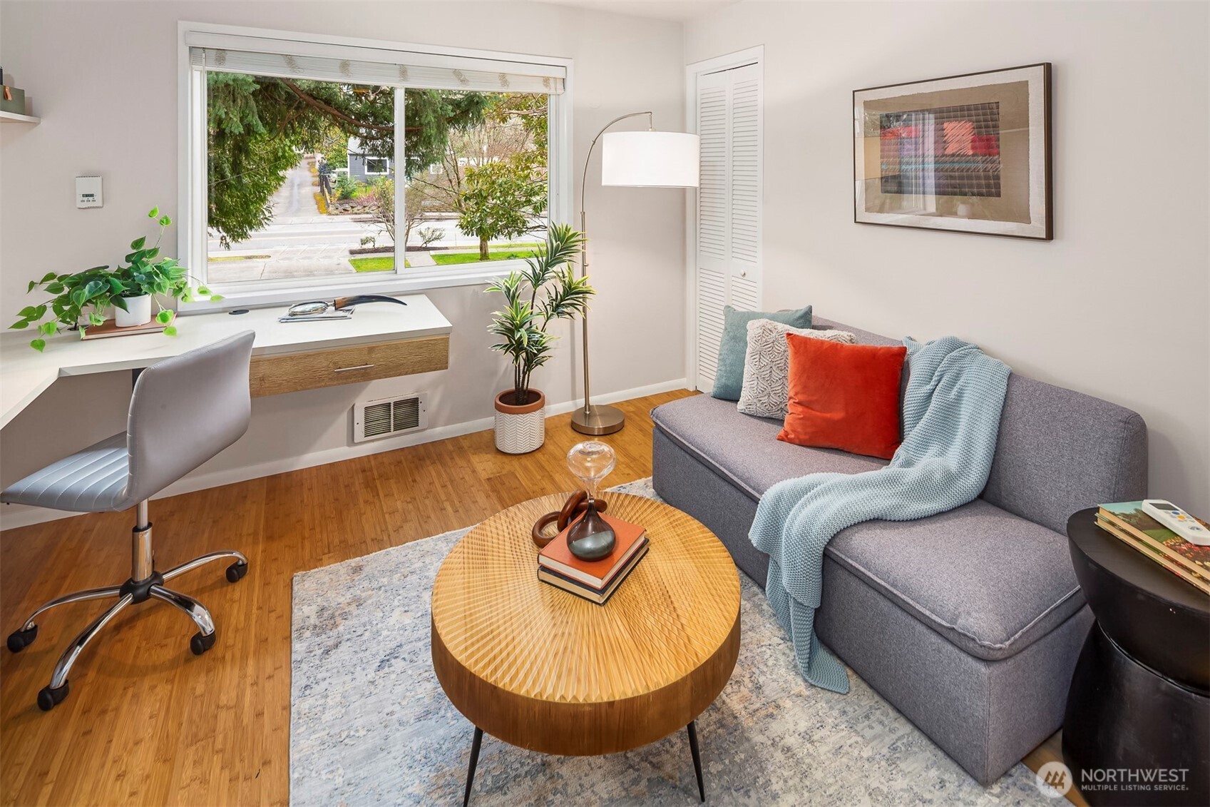 6939 Fauntleroy Way Southwest Seattle, WA 98136 - Photo 23 of 35 a living room with furniture and a large window