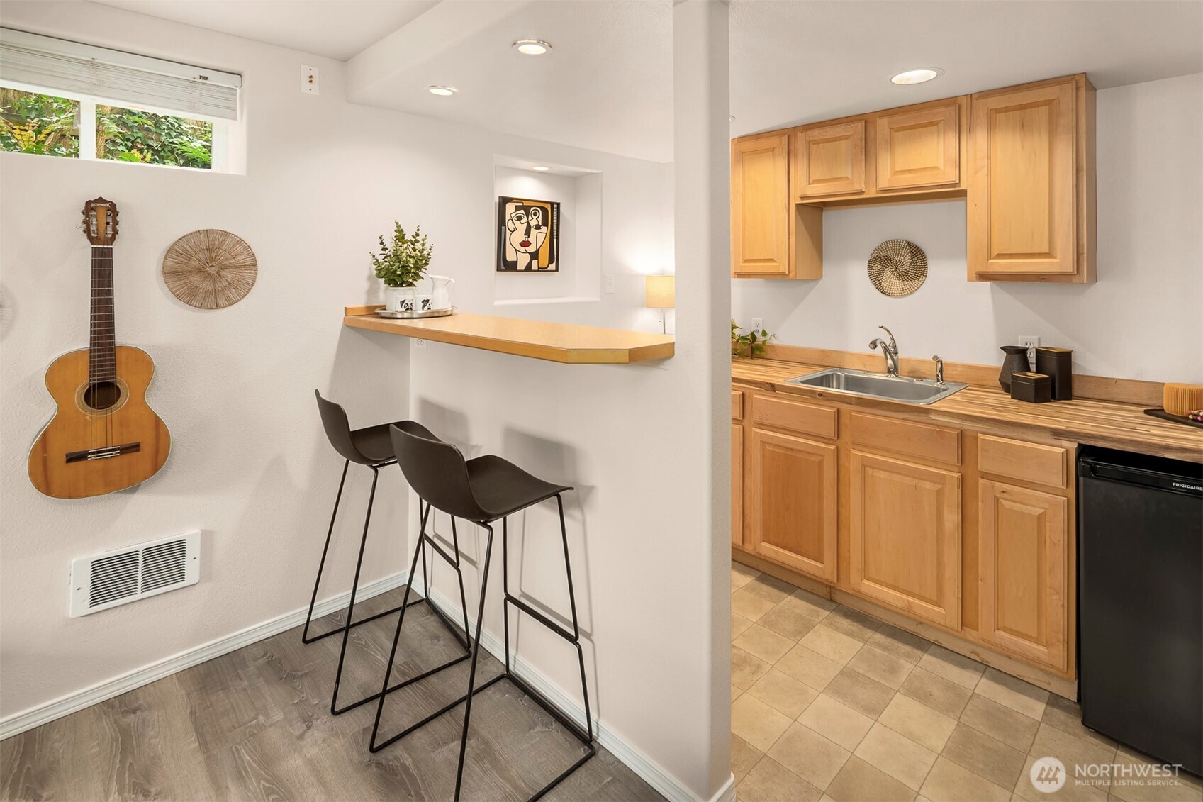 6939 Fauntleroy Way Southwest Seattle, WA 98136 - Photo 27 of 35 a kitchen with a sink cabinets and appliances