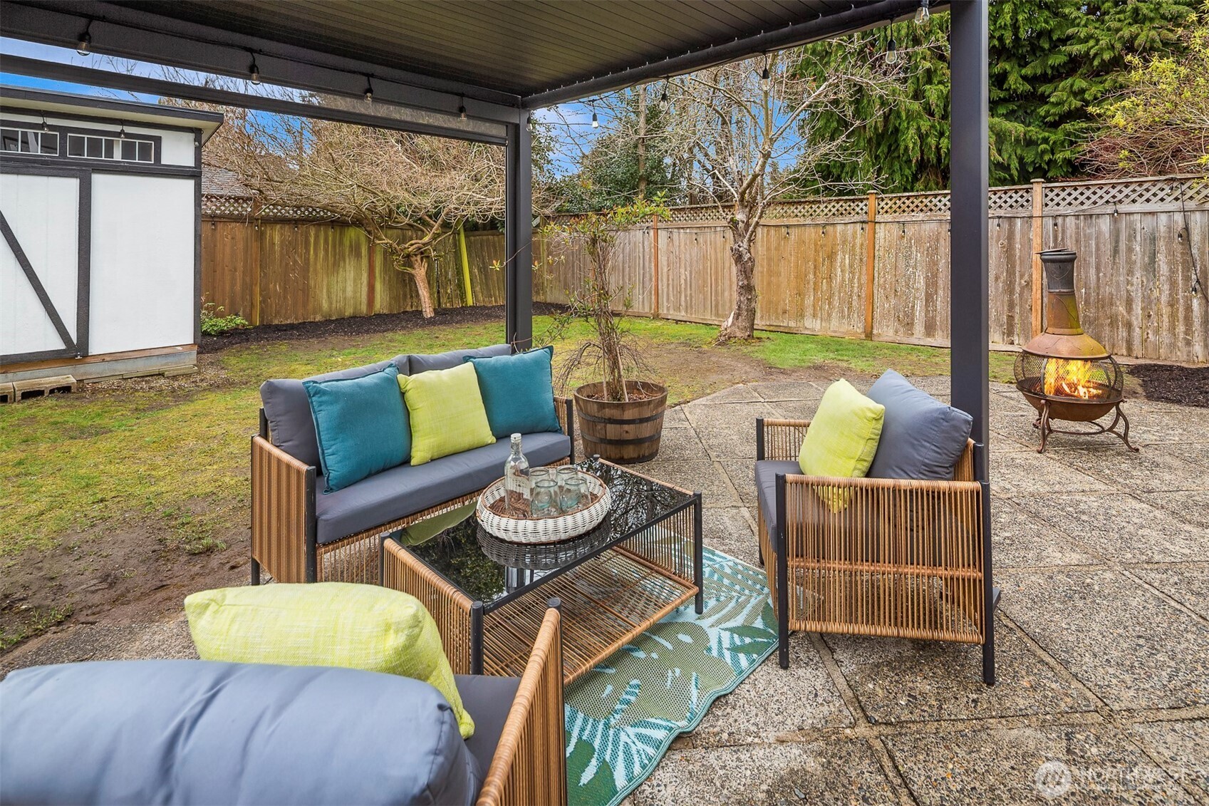 6939 Fauntleroy Way Southwest Seattle, WA 98136 - Photo 32 of 35 a outdoor living space with furniture and garden view