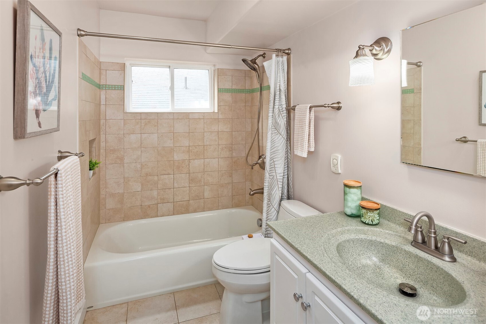 6939 Fauntleroy Way Southwest Seattle, WA 98136 - Photo 9 of 35 a bathroom with a sink a toilet and shower