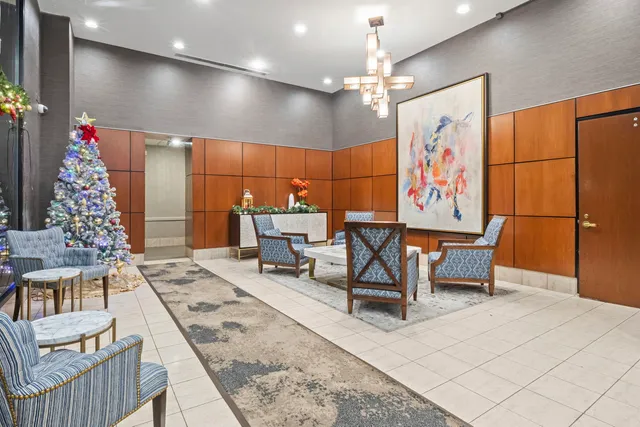 a room with furniture and a chandelier