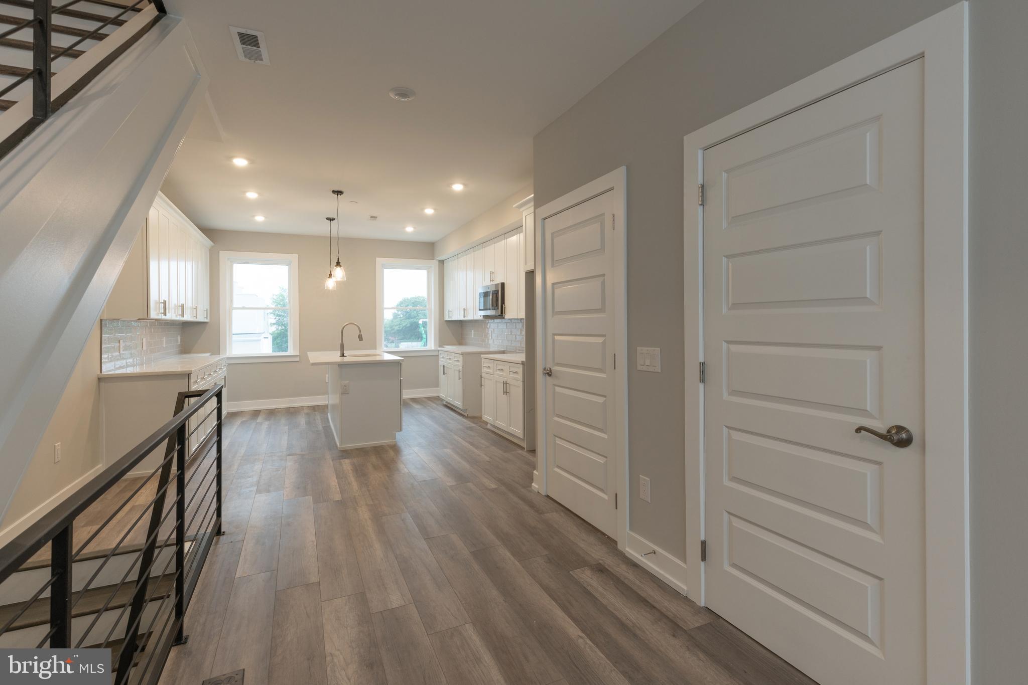 140 West Huntingdon Street, Unit 2 Philadelphia, PA 19133 - Photo 9 of 28 a view of a kitchen with cabinets