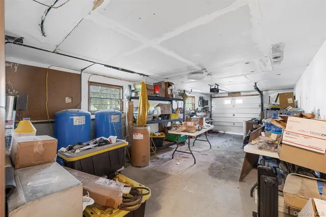 a living room with lots of furniture and a view of living room