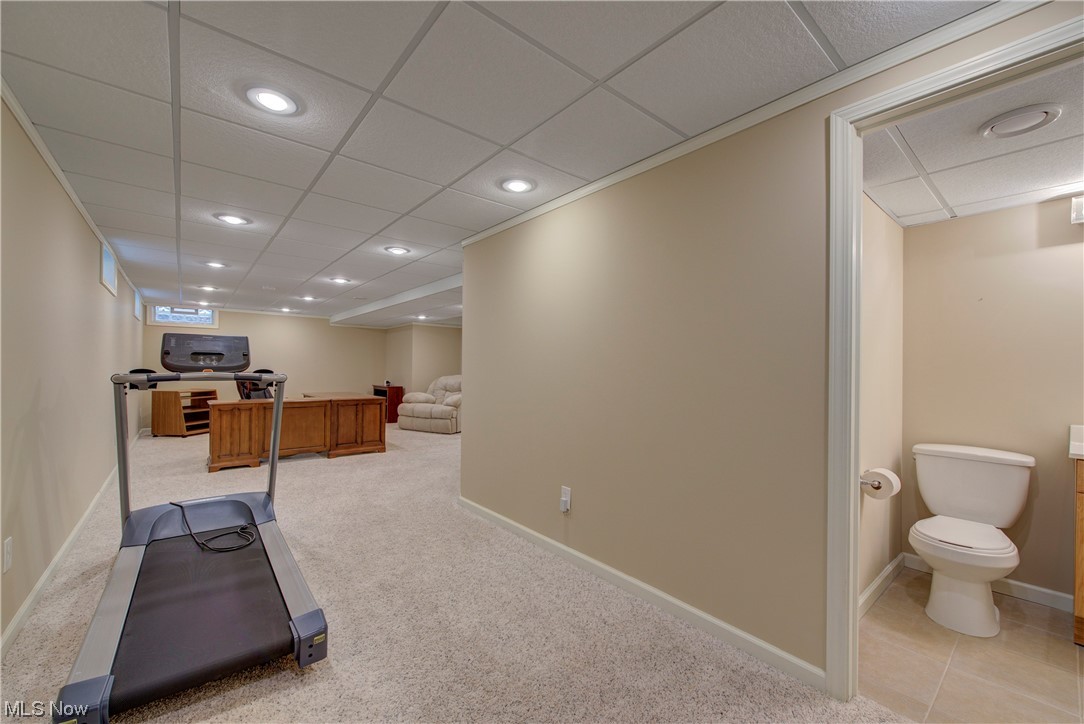 279 Sandstone Ridge Way Berea, OH 44017 - Photo 17 of 29 Workout area featuring a drop ceiling and light carpet