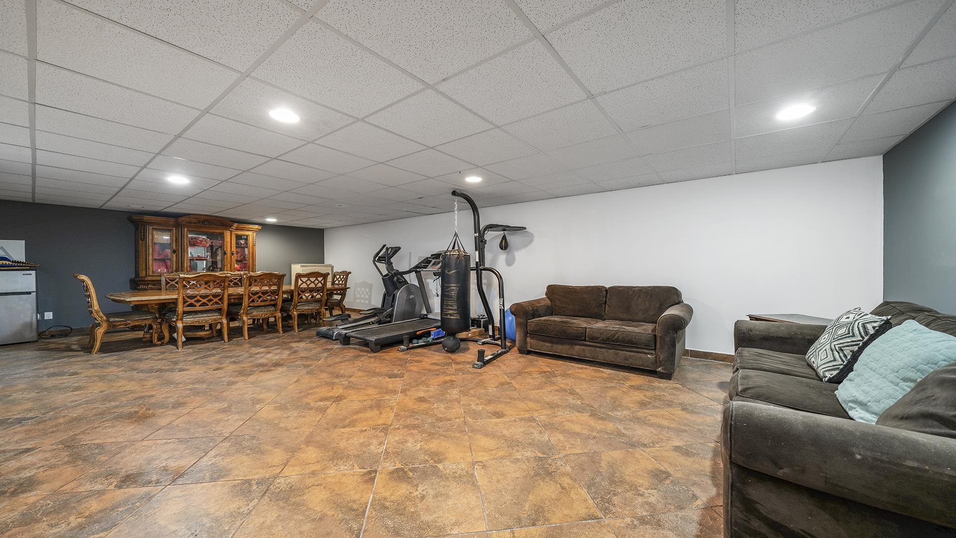 1050 South Trainer Road Rockford, IL 61108 - Photo 21 of 33 a living room with furniture and a flat screen tv
