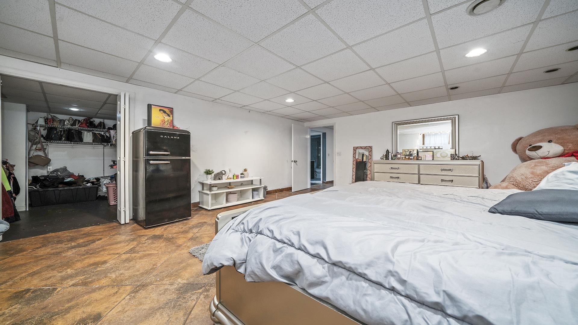 1050 South Trainer Road Rockford, IL 61108 - Photo 27 of 33 a bed room with a bed and a television