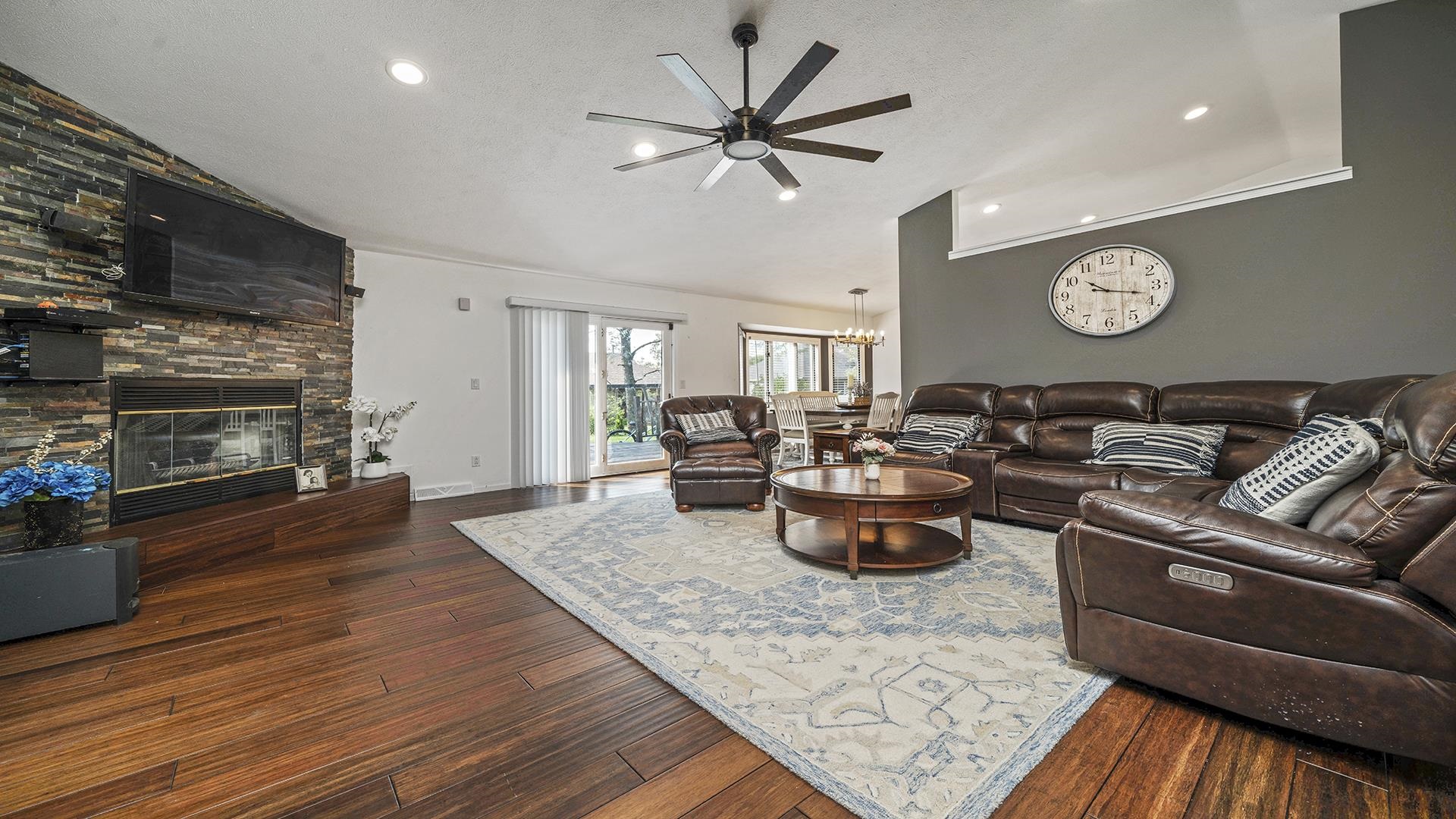1050 South Trainer Road Rockford, IL 61108 - Photo 9 of 33 a living room with furniture and a fireplace