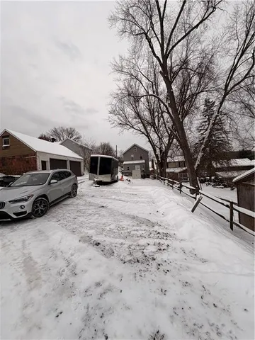 a view of a cars park in front of house