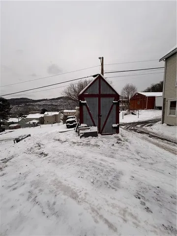 a view of a backyard of a house