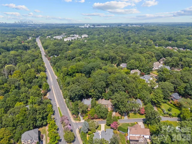 a view of a yard and a house
