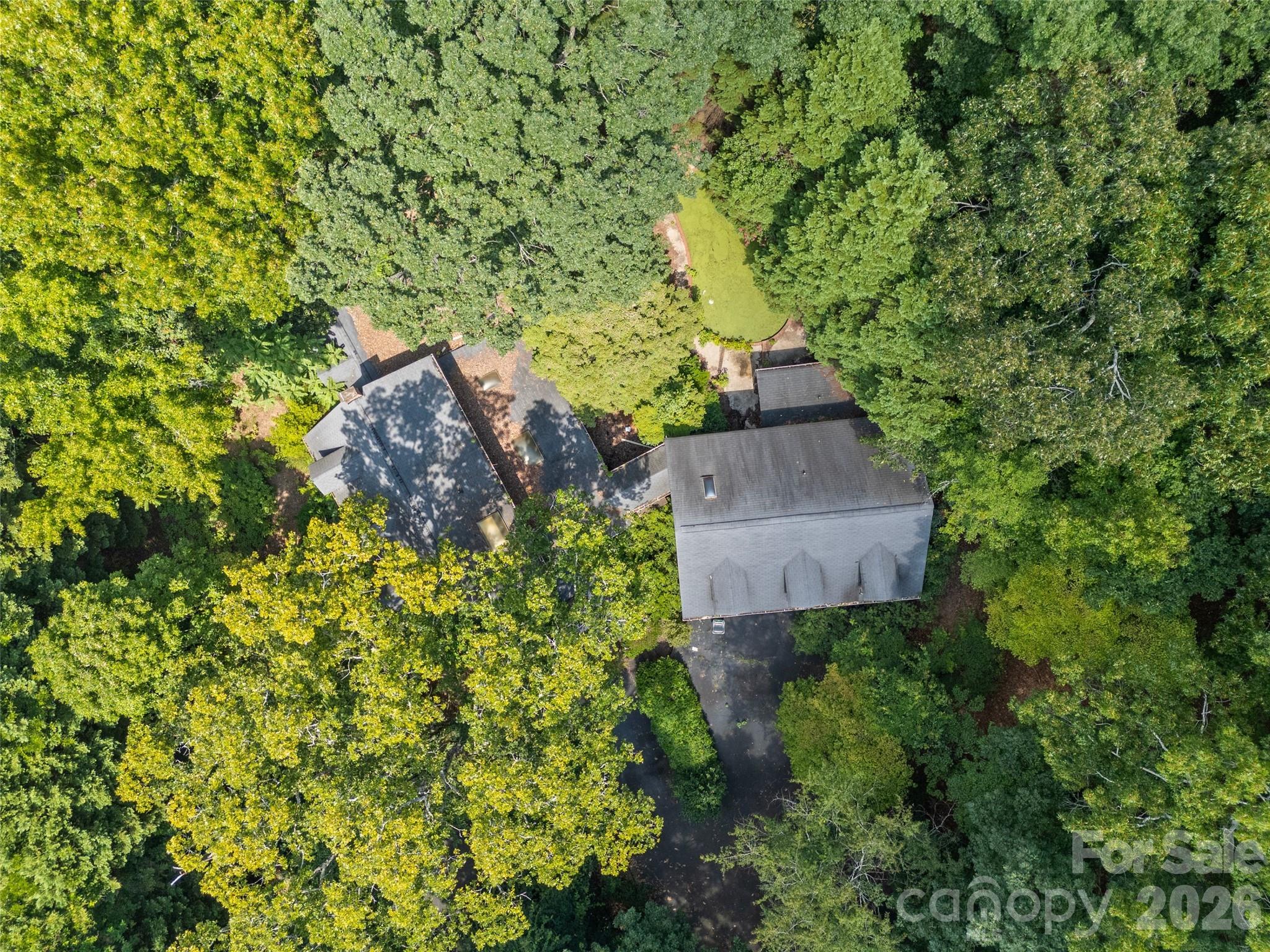 7707 Park Road Charlotte, NC 28210 - Photo 4 of 23 an aerial view of a house with a yard
