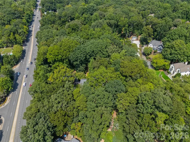 an aerial view of a city with lots of residential buildings