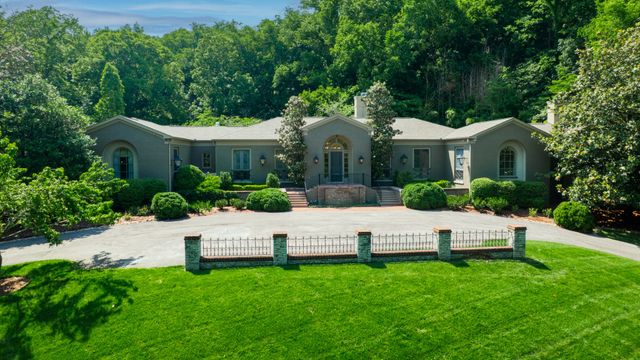 a view of a house with a garden