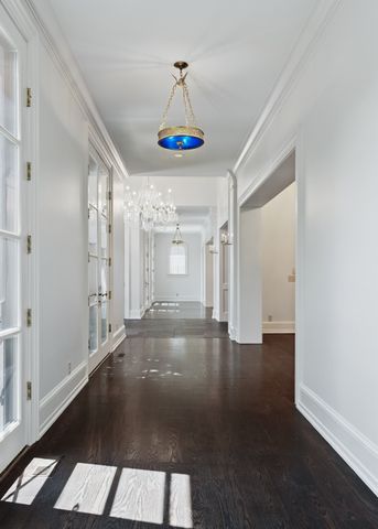 a kitchen with a stove a sink and a refrigerator